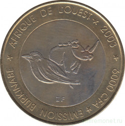 Монета. Западноафриканский экономический и валютный союз (ВСЕАО). Буркина-Фасо. 6000 франков 2003 год. Носорог и Желтоклювый буйволовый скворец.