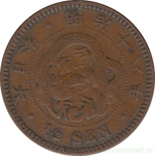 Монета. Япония. 1/2 сена 1885 год (18-й год эры Мэйдзи).