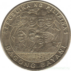 Монета. Филиппины. 5 песо 2014 год. Филиппинские работники за рубежом.