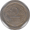 Монета. Индия. 2 анны 1939 год. Лилии на короне пересекают полудугу. ав.