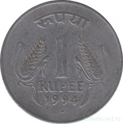 Монета. Индия. 1 рупия 1994 год. Мелкий шрифт цифры.
