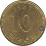 Монета. Южная Корея. 10 вон 1987 год. ав.