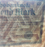 Банкнота. Германия. Веймарская республика. 1000 марок 1922 год. Белая бумага. Водяной знак - рубящие звёзды. Серийный номер - две буквы, шесть цифр (мелкие,зелёные), две буквы. Тип 76а.