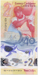 Банкнота. Восточные Карибские острова. 2 доллара 2023 год. 40-летие Восточнокарибского Центрального банка.
