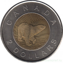 Монета. Канада. 2 доллара 2006 год. 10 лет с начала чекана монет номиналом 2 доллара. Дата сверху.