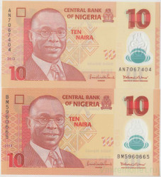 Банкнота. Нигерия. 10 найр 2013 год. ( 2 штуки: Яркий и бледный орнамент). Тип 39d.