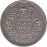 Монета. Британская Индия. 1/4 рупии 1943 год. L. Гурт - рубчатый с желобом. ав.