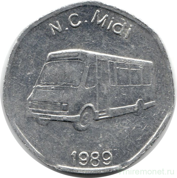 Жетон транспортный. Великобритания. Лондон. Жетон на 1 поездку 20 пенсов 1989 год.