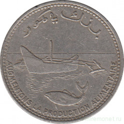 Монета. Коморские острова. 100 франков 1977 год.