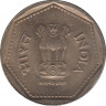 Монета. Индия. 1 рупия 1986 год. Гурт - рубчатый с желобом. рев.