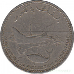 Монета. Коморские острова. 100 франков 2003 год.
