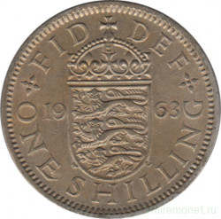 Монета. Великобритания. 1 шиллинг (12 пенсов) 1963 год. Английский.