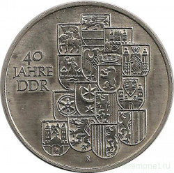 Монета. ГДР. 10 марок 1989 года. 40 лет ГДР.