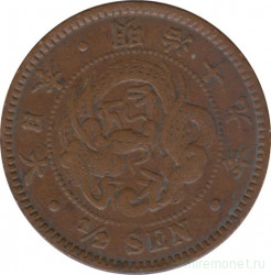 Монета. Япония. 1/2 сена 1886 год (19-й год эры Мэйдзи).