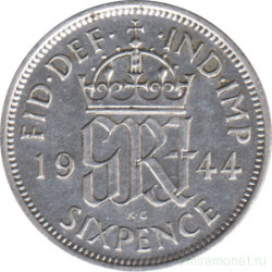 Монета. Великобритания. 6 пенсов 1944 год.