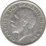 Монета. Великобритания. 1 шиллинг (12 пенсов) 1935 год.