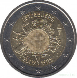Монета. Люксембург. 2 евро 2012 год. 10 лет наличным евро.
